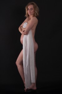 Full Shot of pregnant woman wrapped using shawl in Semi-nude pregnancy photoshoot by Anais Chaine Auckland Photographer