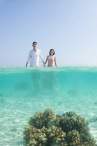 underwater trash the dress at the Malolo sand bar in Fiji
