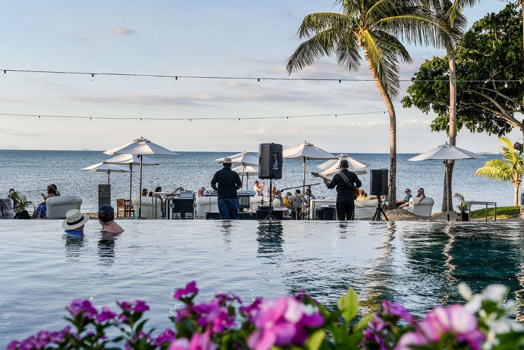 Swimming pool and palm trees at Waitui club