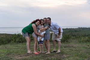 Family hug in family photoshoot in Natadola Fiji