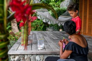 Mom and son play during Fiji family vacation