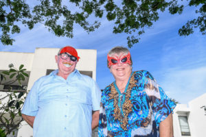 Goofy grandparents where a pirate patch and butterfly mask