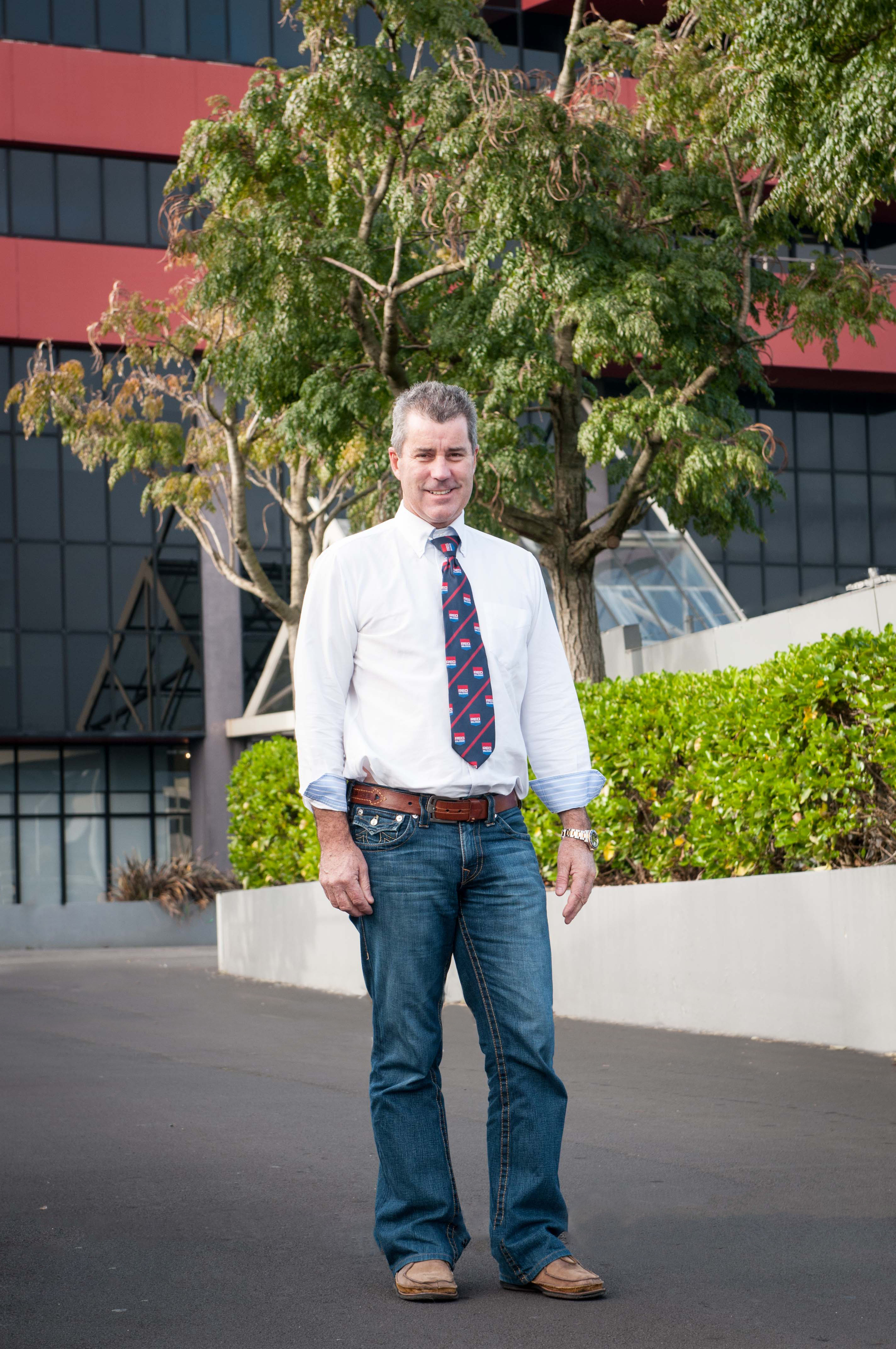 Corporate portrait full length for red badge professional photography Auckland new zealand