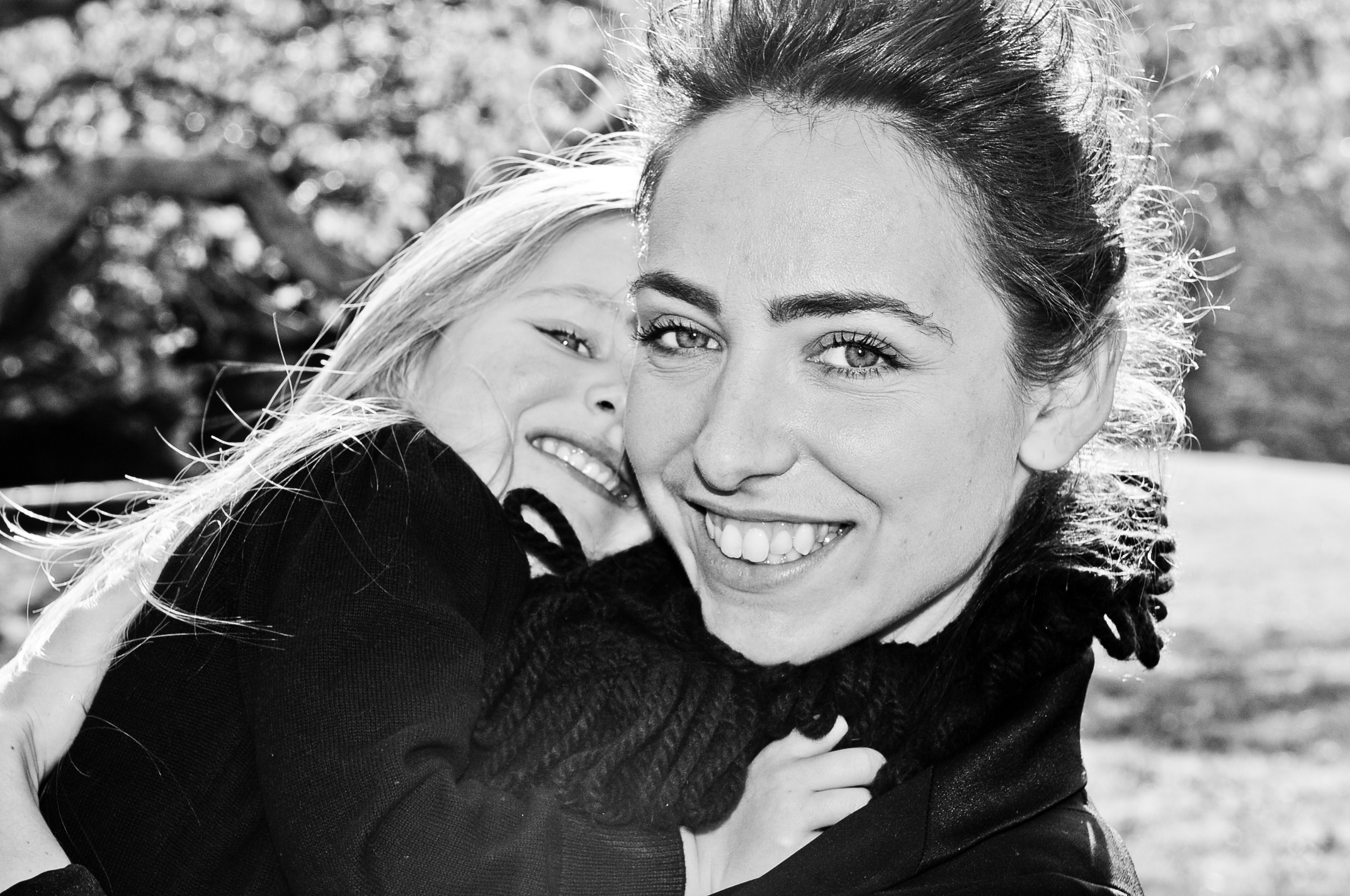 Professional portrait of happy mum and daughter black and white in One Tree hill Park, Auckland, New Zealand
