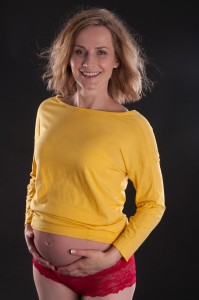 Medium shot of smiling pregnant mother pregnancy photography Anais Chaine Auckland Photographer