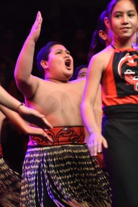 A little maori boy dancing his traditional dance intensely Vodafone Event Centre