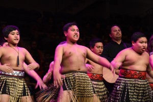 Maori boys dancing their traditional dance intensely