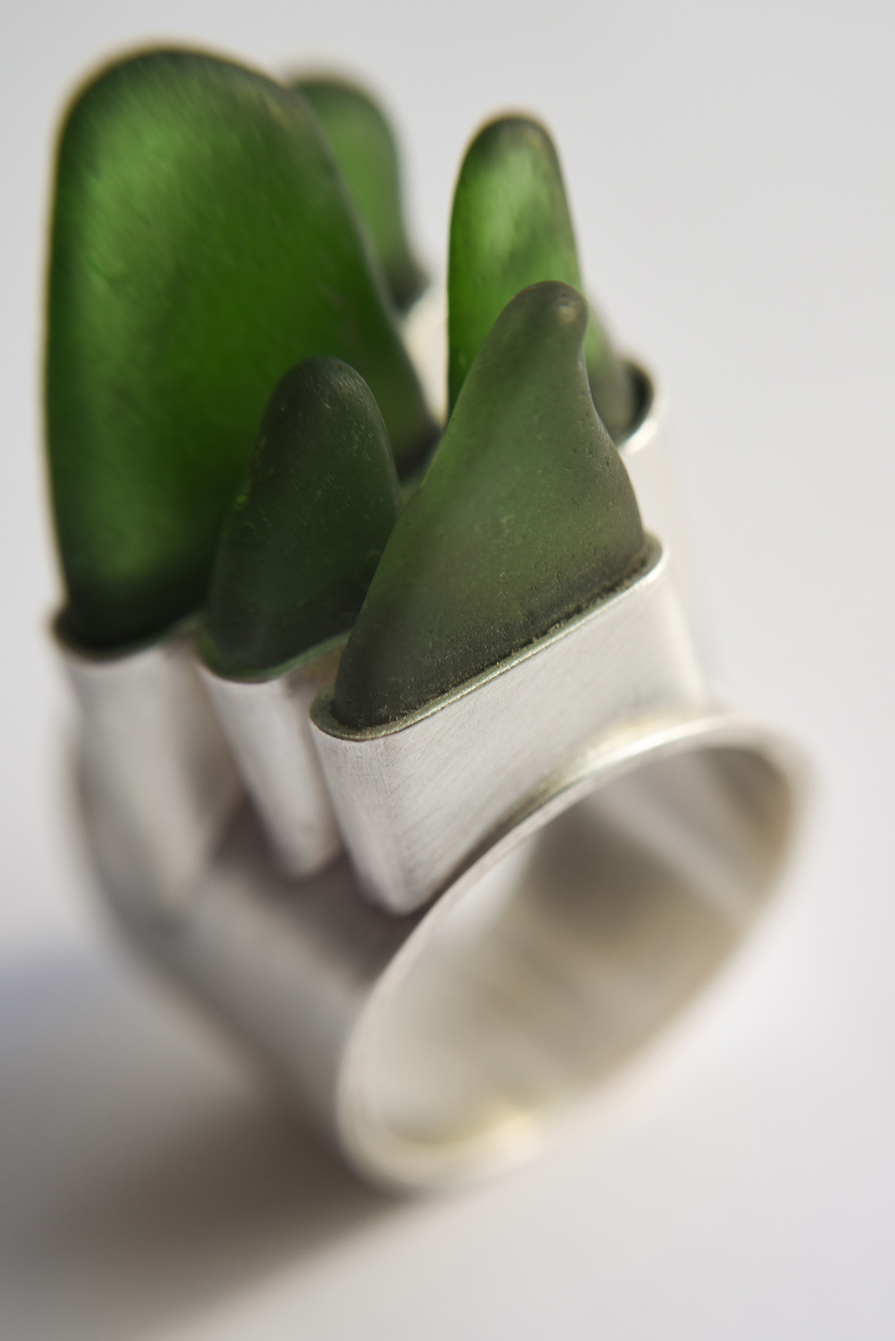 The wave, green beach glass and silver ring by Laura jeweller