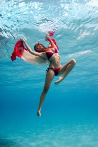 Model woman underwater in Fiji