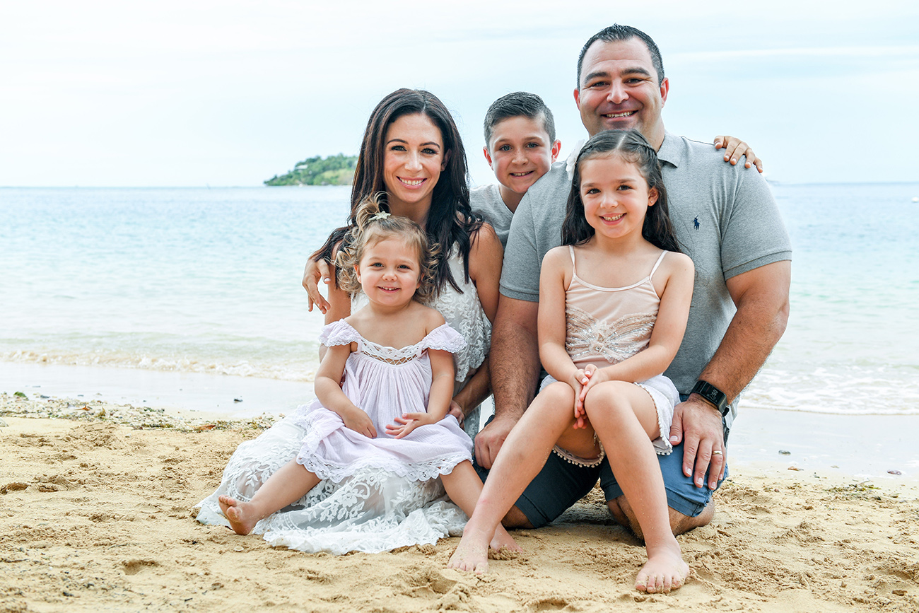 Family photoshoot by the beach in Malolo Island Resort Fiji