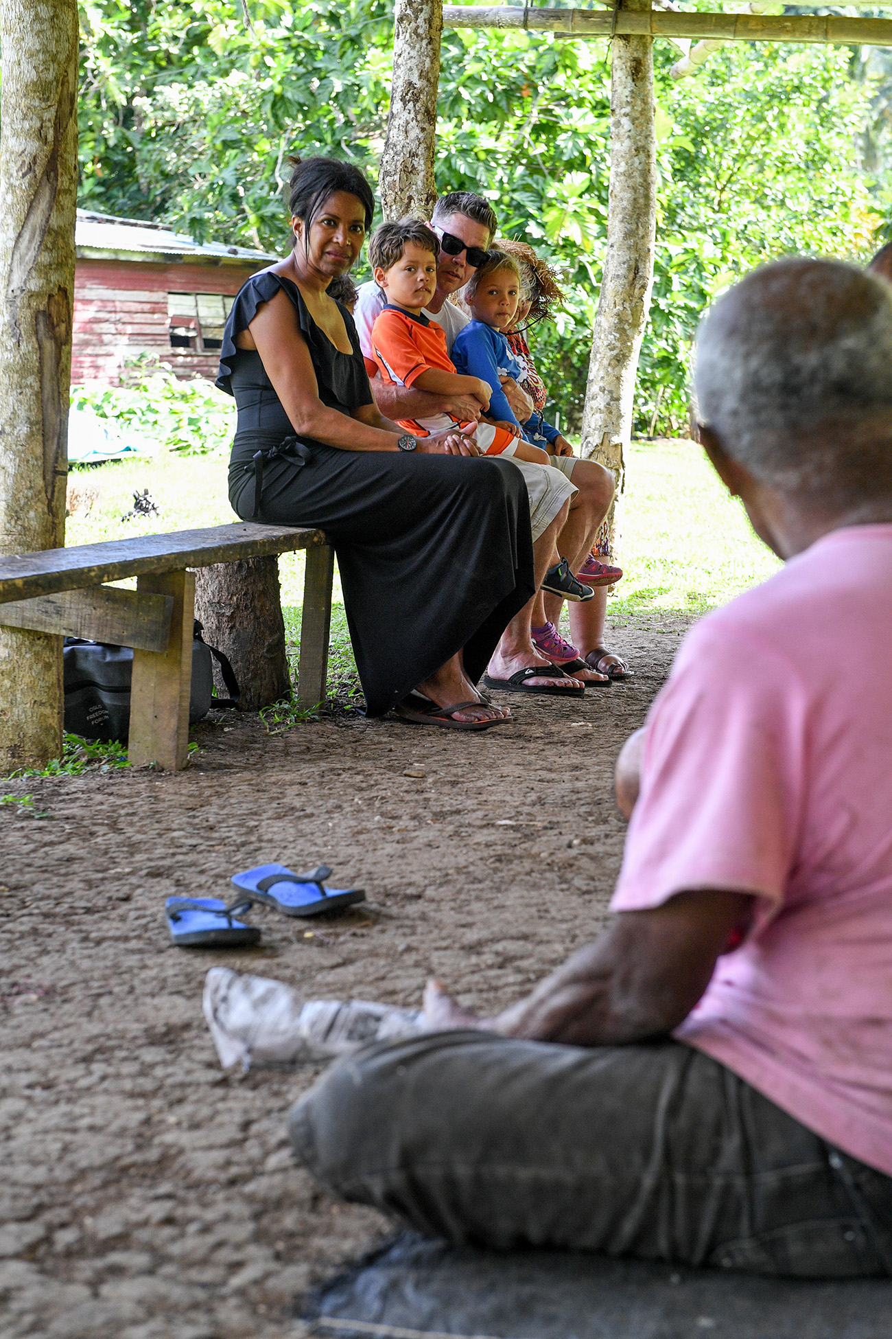Family watches Fiji traditional prayers