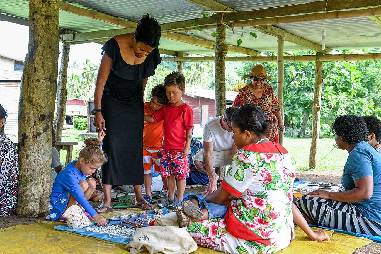 Family mingle with Fiji family during vacation