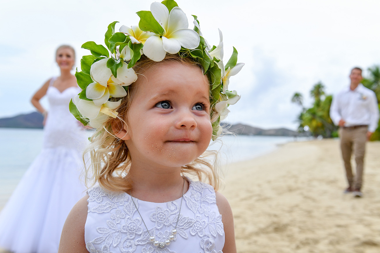 Stunning green-eyed baby girl wearing flower crown
