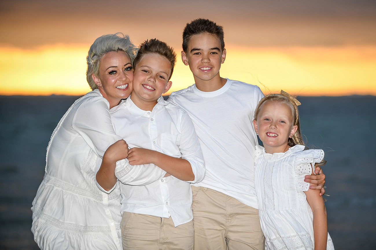 Family photoshoot at sunset by the beach at the Outrigger on the coral coast in Fiji