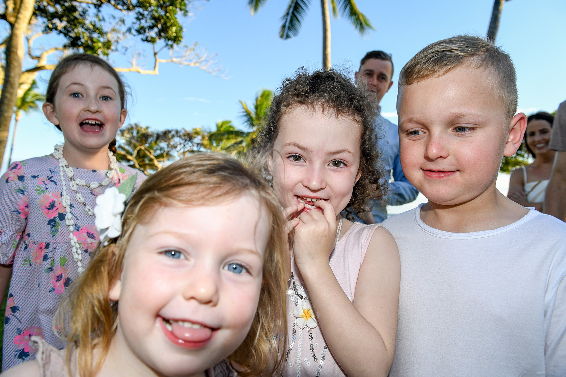 Group shot of cousins at the Shangri La in Fiji on the lawn