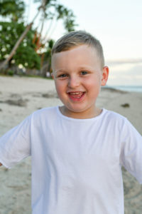 Portrait of a young boy at the beach in Fiji